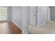Bright hallway featuring decorative trim and doorways to other rooms of the home at 3957 Evans Drive Dr, Lithia Springs, GA 30122