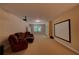 Finished basement featuring a projector screen, comfy seating, and lots of room at 1622 Rivergreen Se Bnd # 26, Atlanta, GA 30339