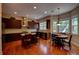 Well-lit kitchen with granite countertops, an island, and stainless steel appliances at 1622 Rivergreen Se Bnd # 26, Atlanta, GA 30339