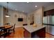 Stylish kitchen with a center island, stainless steel appliances, and hardwood floors at 1622 Rivergreen Se Bnd # 26, Atlanta, GA 30339