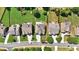 Aerial view of residences showcasing their rooflines, driveways, and neatly manicured lawns in a suburban setting at 3819 Courson St, Marietta, GA 30066