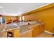 Spacious finished basement with a full bar area featuring granite countertops and stylish cabinetry at 3819 Courson St, Marietta, GA 30066