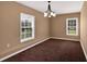 Bedroom with two windows that offer natural light and neutral walls for a calming atmosphere at 3819 Courson St, Marietta, GA 30066