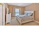 Charming bedroom with light-colored walls, a white bed frame, and a cozy, inviting atmosphere at 3819 Courson St, Marietta, GA 30066