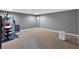 Finished basement exercise room with workout equipment and gray walls for a modern look at 3819 Courson St, Marietta, GA 30066