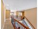 Upstairs hallway with beautiful railings and a view of the downstairs living area at 3819 Courson St, Marietta, GA 30066