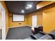 Home theater with projector, screen, comfortable seating and modern finishes offers a cinematic experience at 3819 Courson St, Marietta, GA 30066