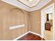 Neutral colored room featuring hardwood floors, arched doorway, and display nook at 3819 Courson St, Marietta, GA 30066