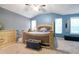 Bedroom with vaulted ceiling and large bed frame at 428 Redwood Trl, Canton, GA 30114
