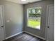 Cozy bedroom featuring neutral colors, gray floors, and natural light at 433 Rhett Dr, Loganville, GA 30052