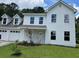 Charming two-story home with a manicured lawn and inviting curb appeal at 433 Rhett Dr, Loganville, GA 30052
