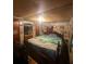 Cozy bedroom features a comfortable bed, soft lighting, and personal touches for relaxation at 6394 Shore Dr, Douglasville, GA 30135