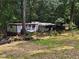 Serene property with lush greenery and a private setting with lots of trees at 6394 Shore Dr, Douglasville, GA 30135