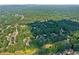 Wide aerial shot displaying an upscale neighborhood featuring a golf course and serene environment at 1313 Fallsbrook Nw Ter, Acworth, GA 30101