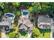 An aerial shot shows the backyard pool, lounge chairs, and well-maintained landscaping at 1313 Fallsbrook Nw Ter, Acworth, GA 30101