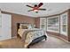 Comfortable bedroom with a queen-sized bed and ample natural light at 1313 Fallsbrook Nw Ter, Acworth, GA 30101