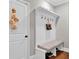 Mudroom with a bench, hooks, and storage space at 1313 Fallsbrook Nw Ter, Acworth, GA 30101
