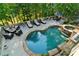 Enjoy resort-style living in this backyard oasis with a sparkling pool, hot tub and expansive patio at 1313 Fallsbrook Nw Ter, Acworth, GA 30101