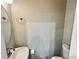 This bathroom has a toilet, sink, mirror, towel ring, and toilet paper holder at 2268 Sparrow Ridge Ne Dr, Marietta, GA 30066