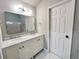 Bathroom features dual sinks, marble countertops, and a large mirror at 2268 Sparrow Ridge Ne Dr, Marietta, GA 30066