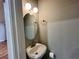 Bathroom with vanity and globe lighting at 2268 Sparrow Ridge Ne Dr, Marietta, GA 30066
