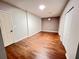 Bedroom with vinyl floors, closet, and a clock on the wall at 2268 Sparrow Ridge Ne Dr, Marietta, GA 30066