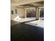 Spacious garage with two open doors and rubber flooring at 2268 Sparrow Ridge Ne Dr, Marietta, GA 30066