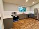 Modern kitchen with stainless steel appliances, gray cabinets, and subway tile backsplash at 2268 Sparrow Ridge Ne Dr, Marietta, GA 30066