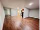 A spacious living room includes hardwood floors and connects to other rooms in the home at 2268 Sparrow Ridge Ne Dr, Marietta, GA 30066