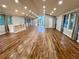 Large open-concept living room with hardwood floors and windows at 2268 Sparrow Ridge Ne Dr, Marietta, GA 30066