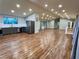 Spacious open-concept living room/kitchen featuring beautiful hardwood floors and vaulted ceiling at 2268 Sparrow Ridge Ne Dr, Marietta, GA 30066