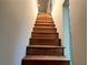 View of wooden stairs with white walls and natural light at 2268 Sparrow Ridge Ne Dr, Marietta, GA 30066