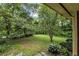 Private backyard surrounded by lush trees and greenery at 4968 Twin Branches Way, Dunwoody, GA 30338