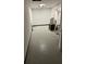 Unfinished basement featuring concrete floor, white walls, pipes, and mechanical equipment at 4968 Twin Branches Way, Dunwoody, GA 30338