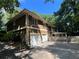 A two-story house with a fenced backyard and a two-car garage at 4968 Twin Branches Way, Dunwoody, GA 30338