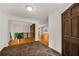 Grand foyer with wooden floors and view to the upper level at 4968 Twin Branches Way, Dunwoody, GA 30338