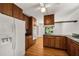 Kitchen featuring wood cabinets and stainless steel appliances at 4968 Twin Branches Way, Dunwoody, GA 30338