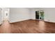 The room features hardwood floors and sliding doors leading to the outdoors at 4968 Twin Branches Way, Dunwoody, GA 30338