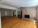 Spacious living area boasting an inviting fireplace and hardwood floors at 4968 Twin Branches Way, Dunwoody, GA 30338
