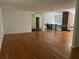 A spacious living room with hardwood floors and fireplace at 4968 Twin Branches Way, Dunwoody, GA 30338