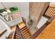 The wooden staircase is in the center of the home and is enhanced by the large window at 4968 Twin Branches Way, Dunwoody, GA 30338