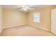 Cozy bedroom with neutral paint, carpet, and natural light from window at 504 N Little Victoria Rd, Woodstock, GA 30189