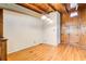 Dining room with wood-paneled walls and hardwood floors at 504 N Little Victoria Rd, Woodstock, GA 30189