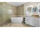 Luxurious bathroom with soaking tub, walk-in shower, and granite countertops at 1165 Laurel Se Pl, Smyrna, GA 30080