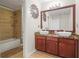 Bathroom with double sink vanity and a tiled shower/tub combination at 1165 Laurel Se Pl, Smyrna, GA 30080