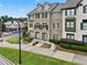 Charming brick townhome with well-manicured landscaping and inviting entrance at 1165 Laurel Se Pl, Smyrna, GA 30080