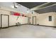 Spacious two car garage with epoxy flooring and ample storage space at 1165 Laurel Se Pl, Smyrna, GA 30080