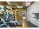 Well-equipped gym with treadmills, sauna, and stylish stone accent wall at 1165 Laurel Se Pl, Smyrna, GA 30080
