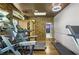 Well-equipped gym with treadmills, sauna, and stylish stone accent wall at 1165 Laurel Se Pl, Smyrna, GA 30080
