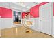 Stylish hallway with a hanging chair and decorative touches at 1165 Laurel Se Pl, Smyrna, GA 30080